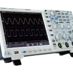 Oscilloscope showing a waveform on its screen with front control knobs and buttons visible.